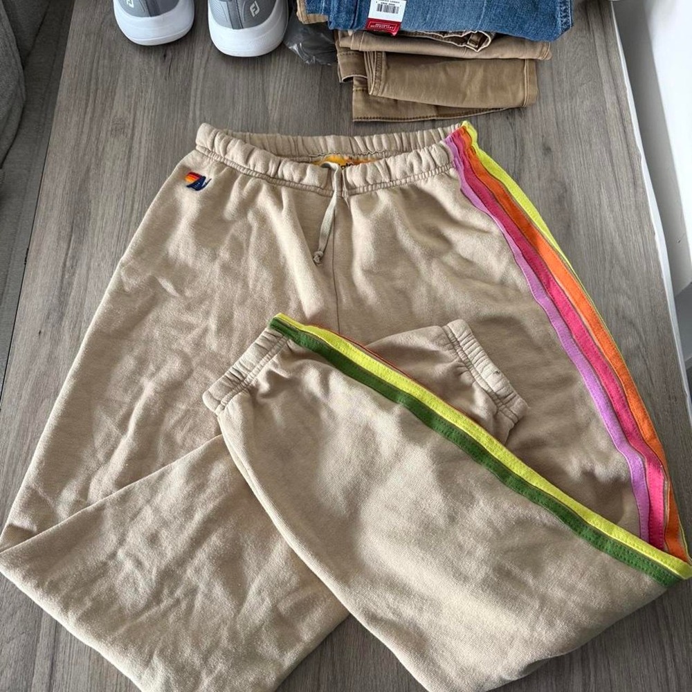 Aviator Nation tan sweatpants with rainbow stripe along the side, size M